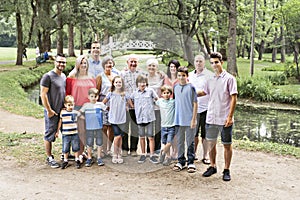 Large family with cousin grandparent father and kid on a forest