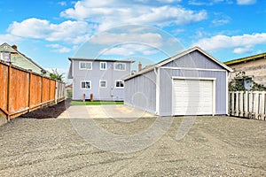 Large fenced back yard with a garage.