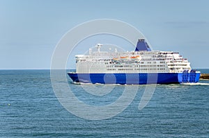 Large Ferry Leaving the Port on a Sunny Day