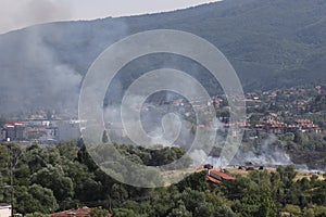A large fire is burning from burning stubble in Sofia, Bulgaria on August, 3, 2021. The fire is burning the forest, field, houses