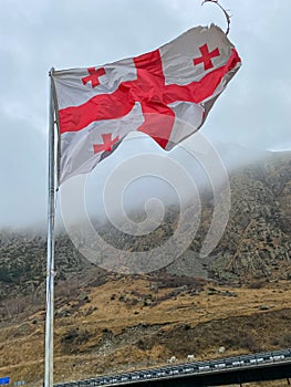 Large flag of Georgia waving in the wind