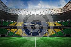 Large football stadium with brasilian fans