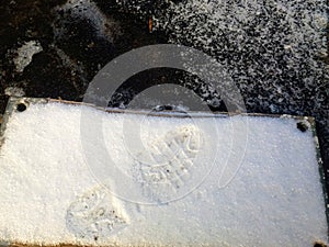 large footprint in stone slab