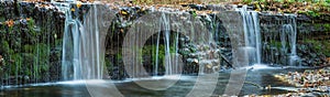 Large-format panorama with a small waterfall