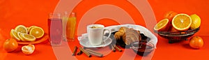 Still life panorama with coffee, croissants and juice