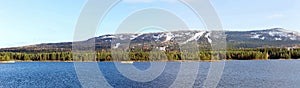 Large-format panorama of the Ural mountains and blue lake