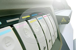 Large format printing machine with lighting on white background