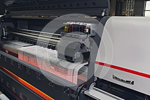 Large format printing machine in operation