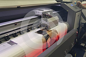 Large format printing machine in operation