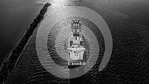 Large full loaded container ship black and white aerial view