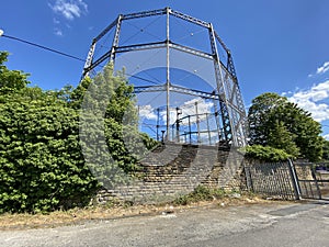 Large gas holder columns, on the outskirts of, Keighley, Yorkshire, UK