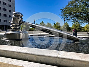 Large gavel statute in water in downtown Columbus