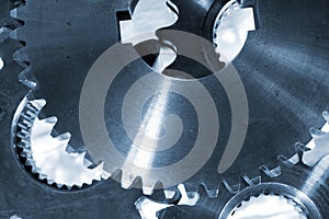 Large gears and cogs, titanium and steel