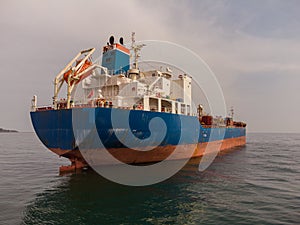 Large general cargo ship tanker bulk carrier, Top down aerial view