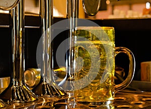 Large glass tankard of draught beer