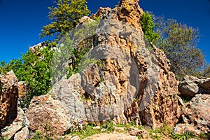 Large Gneiss Rock on a hiking trail in Inks Lake State Park, Texas