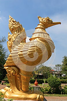 Large golden bird statue