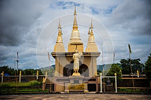 Large golden temple with sky background, Name is Phra Maha Chedi Srivang Chai, Located in Lamphun, Thailand.