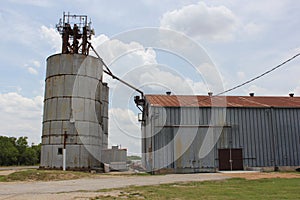 Large Grain Silos Located in Downtown Weir TX