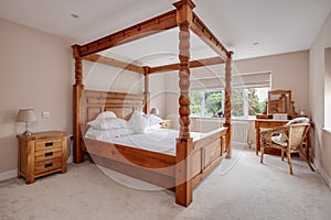 Large grand four poster pine bed