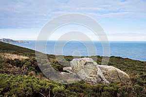 Large granite rock on the Galician coast Spain photo