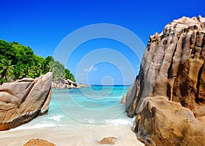 Large granite rocks in Anse Patates beach, La Digue Island, Indian ocean, Seychelles.