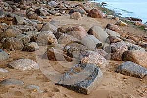 Large granite round stones turned by the sea.