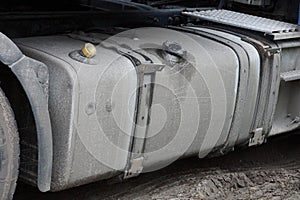 large gray iron gasoline tank on a truck