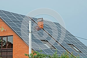 Large gray solar panels on the roof