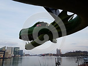 Large green dragon with teeth in Baltimore inner harbor