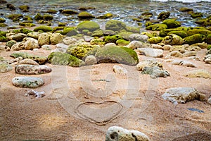 Large green stones on the sea, sand and lettering summer. Thailand. Samui. Gulf of Thailand. Lamai beach