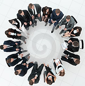 Large group of business people sitting at a business meeting