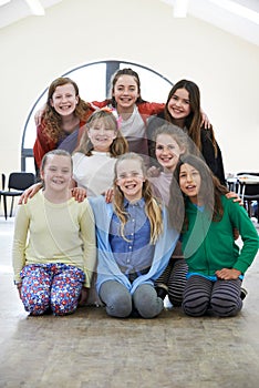 Large Group Of Children Enjoying Drama Workshop Together