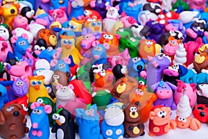 Large group of clay toys