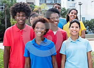 Large group of happy multiethnic young adults