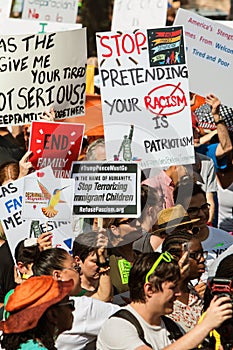 Large Group Holds Signs At Atlanta Immigration Law Protest