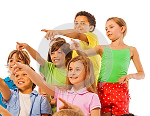 Large group of kids boys and girls pointing finger