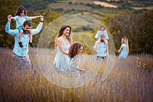 Large group of people in lavender field