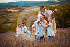 Large group of people in lavender field