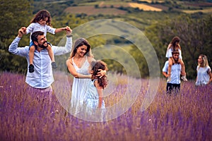 Large group of people in lavender field