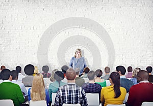 Large Group of People Listening to the Speaker