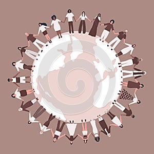 large group of people. Men and women are holding hands, stand around the world map. Multicultural group of people