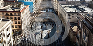 Large Group of People Participating in a Military Parade on a Street. Generative AI.