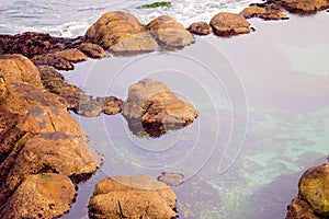 Large group of rocks in Monterey Bay, Monterey, California, USA