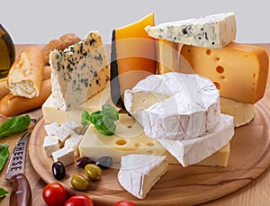 Large Group of Various Types of Cheese