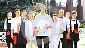 Large group of waiters and waitresses