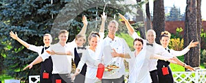 Large group of waiters and waitresses