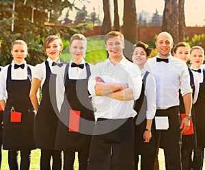 Large group of waiters and waitresses