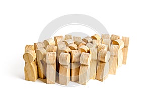 A large group of wooden figures of people. Society, community. social activity. Society, social group. Herd instinct, management