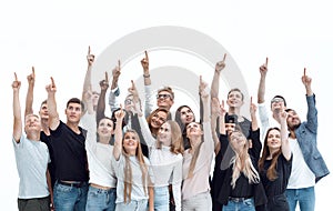 Large group of young people pointing up